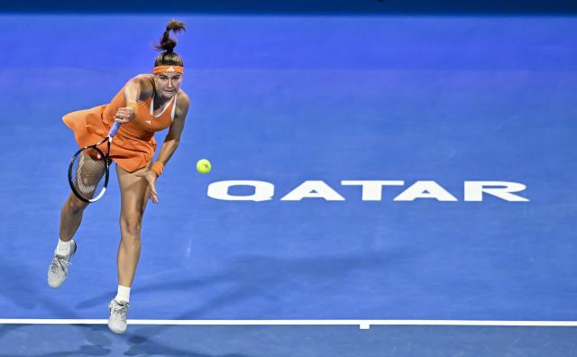 (260215) -- DOHA, Feb. 15, 2026 (Xinhua) -- Karolina Muchova of the Czech Republic serves during the women's singles final match between Karolina Muchova of the Czech Republic and Victoria Mboko of Canada at the WTA Qatar Open 2026 tennis tournament in Doha, Qatar, on Feb. 14, 2026. (Photo by Nikku/Xinhua)