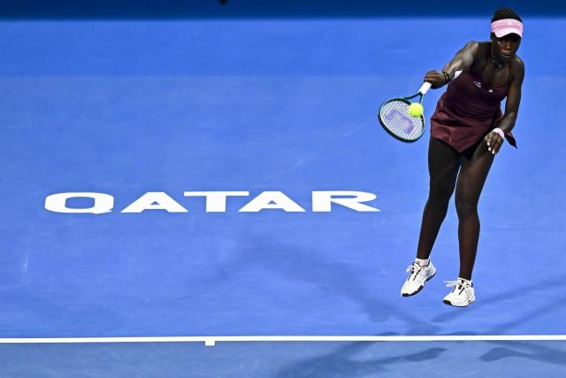 (260215) -- DOHA, Feb. 15, 2026 (Xinhua) -- Victoria Mboko of Canada serves during the women's singles final match between Karolina Muchova of the Czech Republic and Victoria Mboko of Canada at the WTA Qatar Open 2026 tennis tournament in Doha, Qatar, on Feb. 14, 2026. (Photo by Nikku/Xinhua)