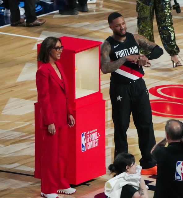 (260215) -- LOS ANGELES, Feb. 15, 2026 (Xinhua) -- Portland Trail Blazers' Damian Lillard (R) reacts after the three point contest at the NBA basketball All-Star weekend festivities in Los Angeles, the United States, Feb. 14, 2026. (Photo by Sun Yuxuan/Xinhua)
