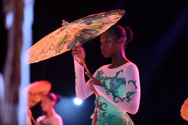 (260215) -- PRAIA, Feb. 15, 2026 (Xinhua) -- A performer dances during a Chinese New Year gala at the National Auditorium in Praia, capital of Cape Verde, Feb. 14, 2026. (Photo by Elton Monteiro/Xinhua)