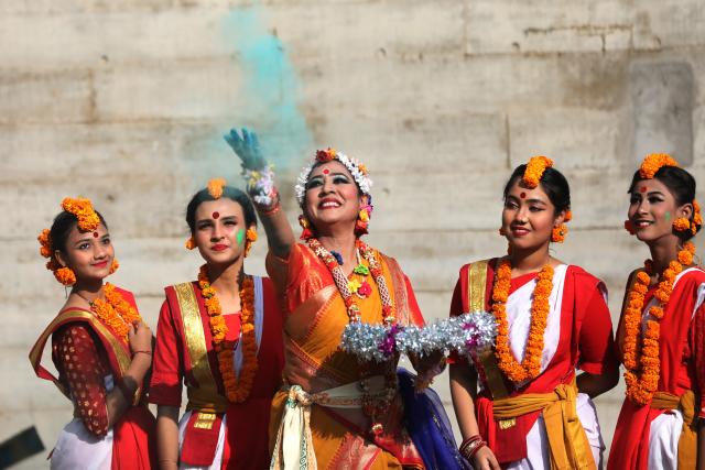 (260215) -- DHAKA, Feb. 15, 2026 (Xinhua) -- Women take part in the celebration of the Pahela Falgun festival in Dhaka, Bangladesh, Feb. 14, 2026. The first day on the eleventh month of the Bengali calendar marks the Pahela Falgun festival, during which people celebrate the beginning of the spring. (Photo by Habibur Rahman/Xinhua)