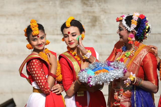 (260215) -- DHAKA, Feb. 15, 2026 (Xinhua) -- Women take part in the celebration of the Pahela Falgun festival in Dhaka, Bangladesh, Feb. 14, 2026. The first day on the eleventh month of the Bengali calendar marks the Pahela Falgun festival, during which people celebrate the beginning of the spring. (Photo by Habibur Rahman/Xinhua)