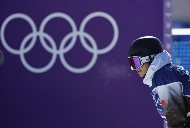 (260215) -- LIVIGNO, Feb. 15, 2026 (Xinhua) -- Yang Wenlong of China reacts after competing at the snowboard men's snowboard slopestyle qualification at the Milan-Cortina 2026 Olympic Winter Games in Livigno, Italy, Feb. 15, 2026. (Xinhua/Wang Peng)