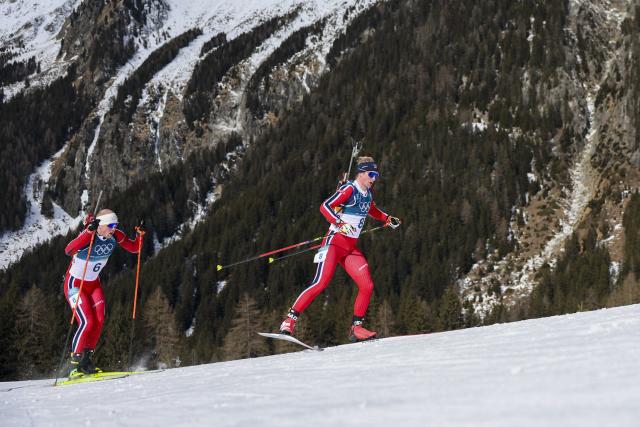 (260215) -- ANTERSELVA, Feb. 15, 2026 (Xinhua) -- Johan-Olav Botn (R) and Johannes Dale-Skjevdal of Norway compete during the biathlon Men's 12.5km Pursuit at the 2026 Milan-Cortina Winter Olympics in Anterselva, Italy, Feb. 15, 2026. (Xinhua/Zhang Tao)