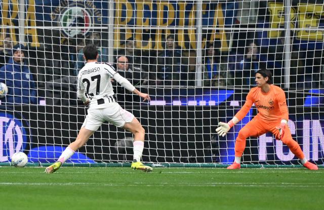 (260215) -- MILAN, Feb. 15, 2026 (Xinhua) -- Juventus' Andrea Cambiaso (L) scores his goal during a Serie A football match between Inter Milan and Juventus in Milan, Italy, Feb. 14, 2026. (Photo by Alberto Lingria/Xinhua)
