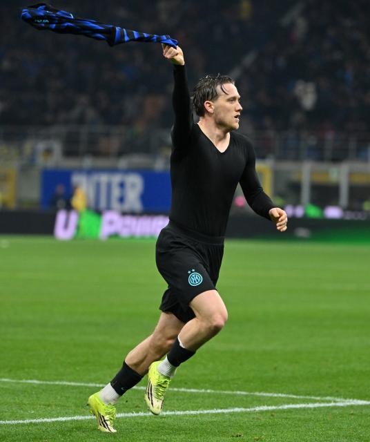 (260215) -- MILAN, Feb. 15, 2026 (Xinhua) -- Inter Milan's Piotr Zielinski celebrates his goal during a Serie A football match between Inter Milan and Juventus in Milan, Italy, Feb. 14, 2026. (Photo by Alberto Lingria/Xinhua)