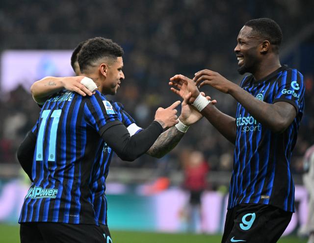 (260215) -- MILAN, Feb. 15, 2026 (Xinhua) -- Inter Milan's Luis Henrique (L) celebrates his goal with his teammates during a Serie A football match between Inter Milan and Juventus in Milan, Italy, Feb. 14, 2026. (Photo by Alberto Lingria/Xinhua)