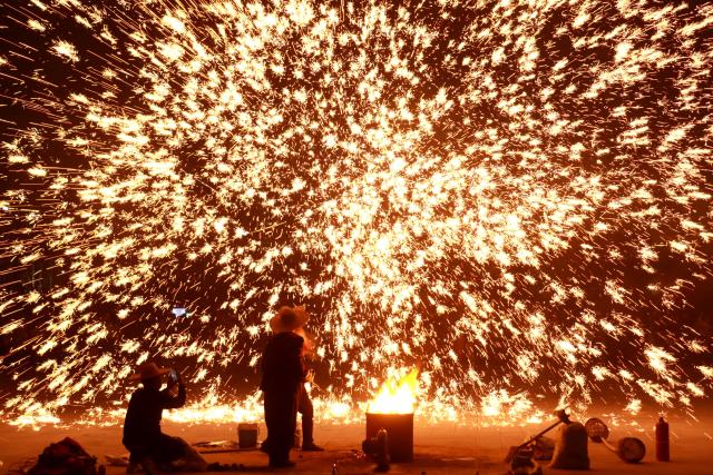 (260215) -- BEIJING, Feb. 15, 2026 (Xinhua) -- Performers stage a molten iron fireworks show in Anyang, central China's Henan Province, Feb. 14, 2026. China is alive with vibrant celebrations with the Spring Festival just around the corner. (Photo by Liu Xiaokun/Xinhua)