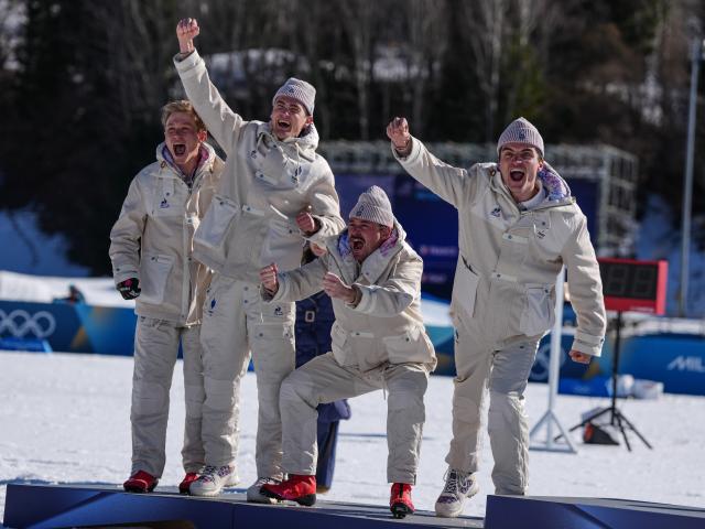 (260215) -- TESERO, Feb. 15, 2026 (Xinhua) -- Silver medalists team France react during the awarding ceremony for the cross-country skiing men's 4X7.5km relay match at the Milan-Cortina 2026 Olympic Winter Games in Tesero, Italy, Feb. 15, 2026. (Xinhua/Peng Ziyang)