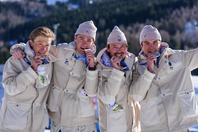 (260215) -- TESERO, Feb. 15, 2026 (Xinhua) -- Silver medalists team France pose during the awarding ceremony for the cross-country skiing men's 4X7.5km relay match at the Milan-Cortina 2026 Olympic Winter Games in Tesero, Italy, Feb. 15, 2026. (Xinhua/Peng Ziyang)