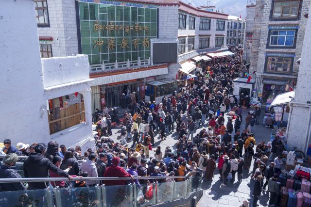 (260215) -- LHASA, Feb. 15, 2026 (Xinhua) -- People shop at a market in Lhasa, southwest China's Xizang Autonomous Region, Feb. 15, 2026. With the Spring Festival and the Tibetan New Year right around the corner, market places in Lhasa receive a surge of customers buying goods needed for the holidays. (Xinhua/Tenzin Nyida)