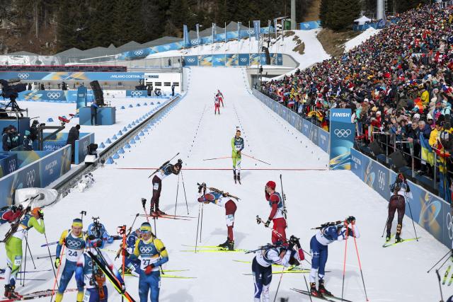 (260215) -- ANTERSELVA, Feb. 15, 2026 (Xinhua) -- Athletes rest after the biathlon Men's 12.5km Pursuit at the 2026 Milan-Cortina Winter Olympics in Anterselva, Italy, Feb. 15, 2026. (Xinhua/Zhang Tao)