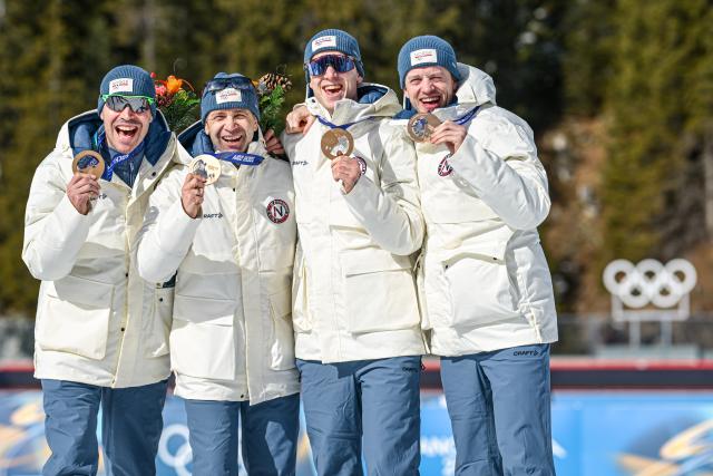 (260215) -- ANTERSELVA, Feb. 15, 2026 (Xinhua) -- Tarjei Boe, Johannes Thingnes Boe, Ole Einar Bjoerndalen and Emil Hegle Svendsen of Norway, bronze medalists for the men's 4x7.5-kilometer biathlon relay race from the 2014 Sochi Winter Olympics, pose for photos with the medals during a reallocation medals ceremony at the 2026 Winter Olympics in Anterselva, Italy, Feb. 15, 2026. (Xinhua/Jiang Han)