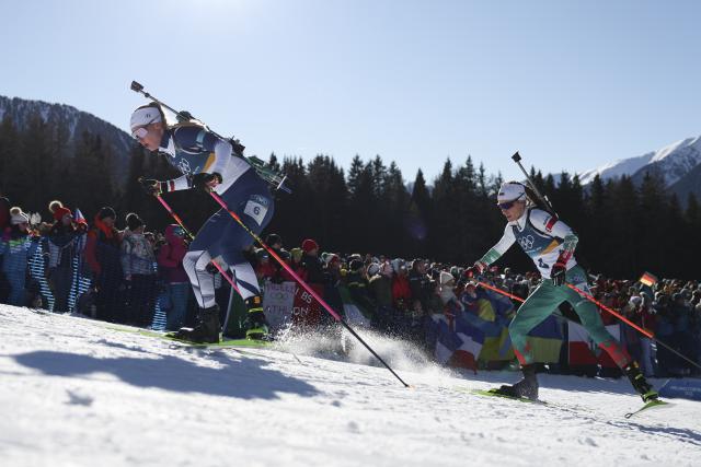 (260215) -- ANTERSELVA), Feb. 15, 2026 (Xinhua) -- Suvi Minkkinen of Finland (L) competes during the biathlon women's 10km pursuit at the 2026 Milan-Cortina Winter Olympics in Anterselva, Italy, Feb. 15, 2026. (Xinhua/Zhang Tao)