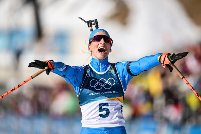 (260215) -- ANTERSELVA), Feb. 15, 2026 (Xinhua) -- Lisa Vittozzi of Italy celebrates after the biathlon women's 10km pursuit at the 2026 Milan-Cortina Winter Olympics in Anterselva, Italy, Feb. 15, 2026. (Xinhua/Jiang Han)