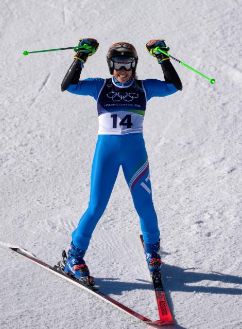 (260215) -- CORTINA D'AMPEZZO, Feb. 15, 2026 (Xinhua) -- Federica Brignone of Italy celebrates after the alpine skiing women's giant slalom run 2 at the Milan-Cortina 2026 Olympic Winter Games in Cortina, Italy, Feb. 15, 2026. (Xinhua/Fei Maohua)