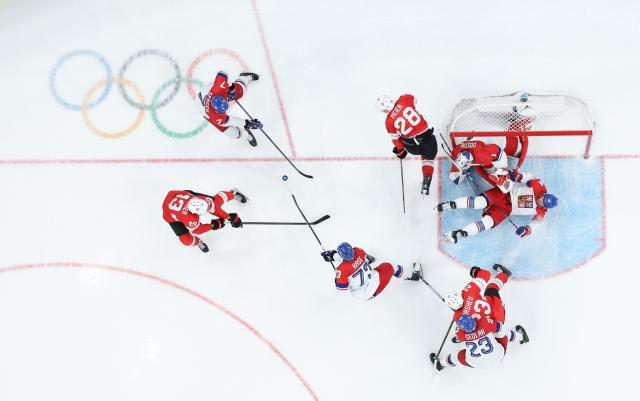 (260215) -- MILAN, Feb. 15, 2026 (Xinhua) -- Nico Hischier (1st L) of Switzerland competes during the ice hockey men's preliminary round group A match between Switzerland and the Czech Republic of the Milan-Cortina 2026 Olympic Winter Games in Milan, Italy, Feb. 15, 2026. (Xinhua/Tao Xiyi)