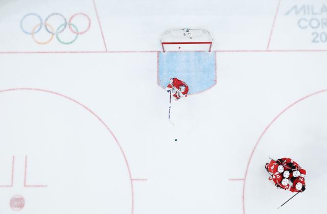 (260215) -- MILAN, Feb. 15, 2026 (Xinhua) -- Players of the Czech Republic reacts after losing the ice hockey men's preliminary round group A match between Switzerland and the Czech Republic of the Milan-Cortina 2026 Olympic Winter Games in Milan, Italy, Feb. 15, 2026. (Xinhua/Tao Xiyi)