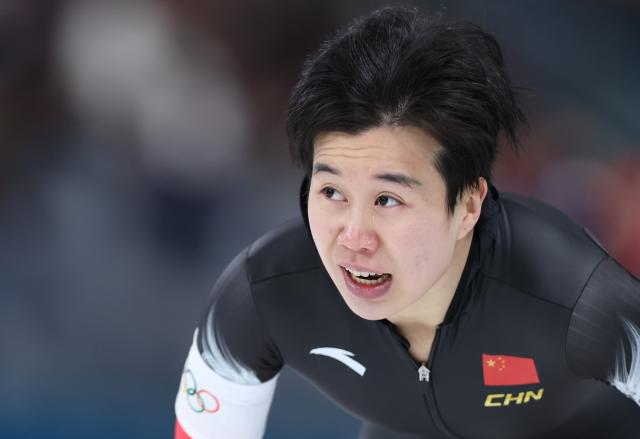 (260215) -- MILAN, Feb. 15, 2026 (Xinhua) -- Tian Ruining of China reacts after the speed skating women's 500m final match at the Milan-Cortina 2026 Olympic Winter Games in Milan, Italy, Feb. 15, 2026. (Xinhua/Du Xiaoyi)