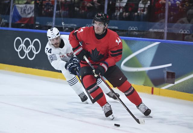 (260215) -- MILAN, Feb. 15, 2026 (Xinhua) -- Bo Horvat (front) of Canada competes during the ice hockey men's preliminary round group A match between Canada and France at the Milan-Cortina 2026 Olympic Winter Games in Milan, Italy, Feb. 15, 2026. (Xinhua/Zhang Haofu)