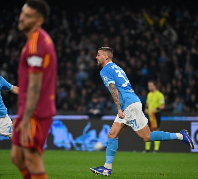 (260216) -- NAPLES, Feb. 16, 2026 (Xinhua) -- Napoli's Leonardo Spinazzola (R) celebrates his goal during a Serie A soccer match between Napoli and Roma in Naples, Italy, Feb. 15, 2026. (Photo by Alberto Lingria/Xinhua)