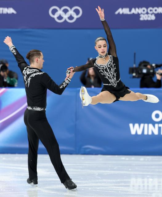 (260216) -- MILAN, Feb. 16, 2026 (Xinhua) -- Karina Akopova and Nikita Rakhmanin of Armenia perform during the figure skating pair skating short program match at the Milan-Cortina 2026 Olympic Winter Games in Milan, Italy, Feb. 15, 2026. (Xinhua/Li Ming)