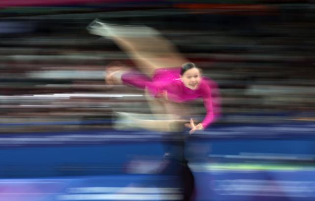 (260216) -- MILAN, Feb. 16, 2026 (Xinhua) -- Ioulia Chtchetinina and Michal Wozniak of Poland perform during the figure skating pair skating short program match at the Milan-Cortina 2026 Olympic Winter Games in Milan, Italy, Feb. 15, 2026. (Xinhua/Li Ming)