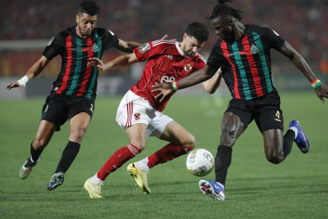 (260216) -- CAIRO, Feb. 16, 2026 (Xinhua) -- Al Ahly FC's Mohamed Ali (C) competes during the CAF Champions League Group B match between Al Ahly FC of Egypt and AS FAR of Morocco in Cairo, Egypt, Feb. 15, 2026. (Xinhua/Ahmed Gomaa)
