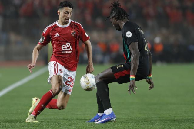 (260216) -- CAIRO, Feb. 16, 2026 (Xinhua) -- Al Ahly FC's Taher Mohamed (L) competes during the CAF Champions League Group B match between Al Ahly FC of Egypt and AS FAR of Morocco in Cairo, Egypt, Feb. 15, 2026. (Xinhua/Ahmed Gomaa)