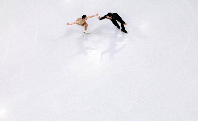 (260216) -- MILAN, Feb. 16, 2026 (Xinhua) -- Deanna Stellato-Dudek and Maxime Deschamps of Canada perform during the figure skating pair skating short program match at the Milan-Cortina 2026 Olympic Winter Games in Milan, Italy, Feb. 15, 2026. (Xinhua/Li Ming)