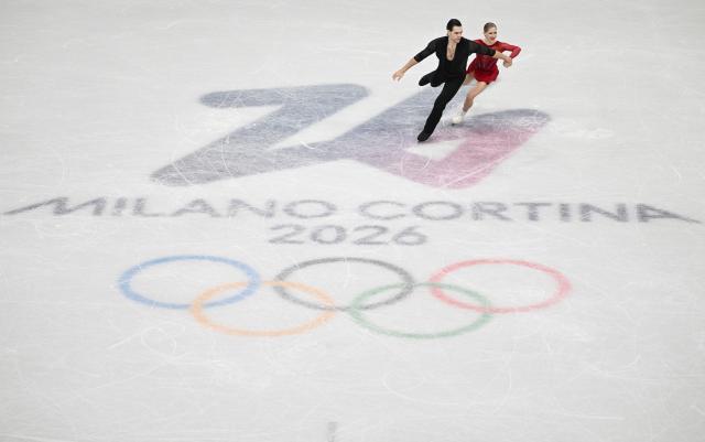 (260216) -- MILAN, Feb. 16, 2026 (Xinhua) -- Minerva Fabienne Hase and Nikita Volodin of Germany perform during the figure skating pair skating short program match at the Milan-Cortina 2026 Olympic Winter Games in Milan, Italy, Feb. 15, 2026. (Xinhua/Cheng Min)
