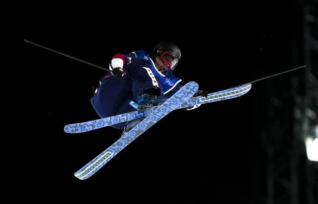 (260216) -- LIVIGNO, Feb. 16, 2026 (Xinhua) -- Troy Podmilsak of the United States competes during the freestyle skiing men's big air qualification at the Milan-Cortina 2026 Olympic Winter Games in Livigno, Italy, Feb. 15, 2026. (Xinhua/Xia Yifang)