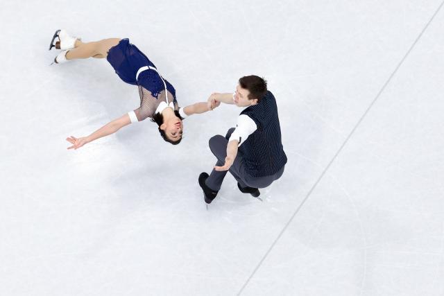 (260216) -- MILAN, Feb. 16, 2026 (Xinhua) -- Camille Kovalev/Pavel Kovalev of France perform during the figure skating pair skating short program match at the Milan-Cortina 2026 Olympic Winter Games in Milan, Italy, Feb. 15, 2026. (Xinhua/Chen Yichen)