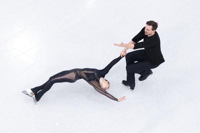 (260216) -- MILAN, Feb. 16, 2026 (Xinhua) -- Daria Danilova and Michel Tsiba of the Netherlands perform during the figure skating pair skating short program match at the Milan-Cortina 2026 Olympic Winter Games in Milan, Italy, Feb. 15, 2026. (Xinhua/Chen Yichen)
