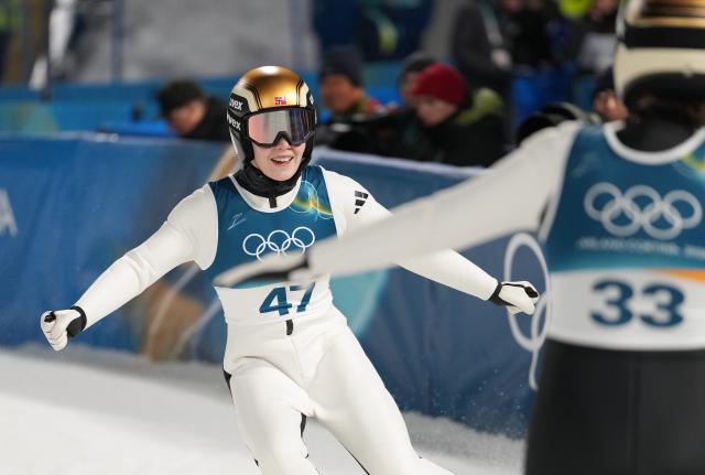 (260216) -- PREDAZZO, Feb. 16, 2026 (Xinhua) -- Norway's Anna Odine Stroem celebrates after ski jumping women's large hill individual event at the Milan-Cortina 2026 Olympic Winter Games in Predazzo, Italy, Feb. 15, 2026. (Xinhua/Meng Yongmin)
