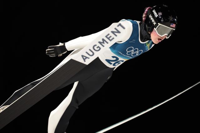 (260216) -- PREDAZZO, Feb. 16, 2026 (Xinhua) -- Josie Johnson of the United States competes during the first round of ski jumping women's large hill individual event at the Milan-Cortina 2026 Olympic Winter Games in Predazzo, Italy, Feb. 15, 2026. (Xinhua/Huang Wei)