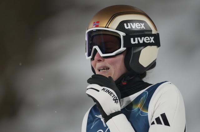 (260216) -- PREDAZZO, Feb. 16, 2026 (Xinhua) -- Norway's Silje Opseth reacs reacts during the final round of ski jumping women's large hill individual event at the Milan-Cortina 2026 Olympic Winter Games in Predazzo, Italy, Feb. 15, 2026. (Xinhua/Huang Wei)