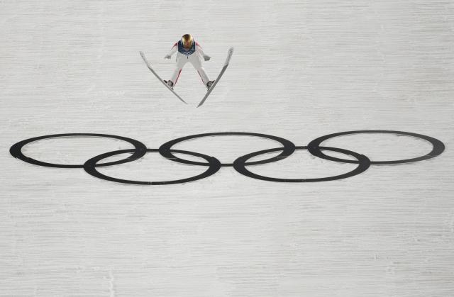 (260216) -- PREDAZZO, Feb. 16, 2026 (Xinhua) -- Zeng Ping of China competes during the final round of ski jumping women's large hill individual event at the Milan-Cortina 2026 Olympic Winter Games in Predazzo, Italy, Feb. 15, 2026. (Xinhua/Huang Wei)