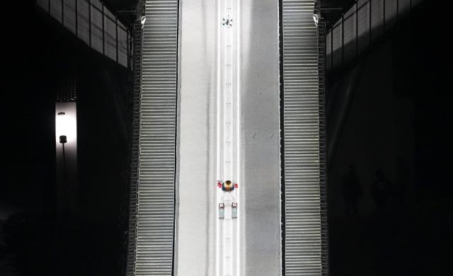 (260216) -- PREDAZZO, Feb. 16, 2026 (Xinhua) -- Zeng Ping of China competes during the final round of ski jumping women's large hill individual event at the Milan-Cortina 2026 Olympic Winter Games in Predazzo, Italy, Feb. 15, 2026. (Xinhua/Huang Wei)
