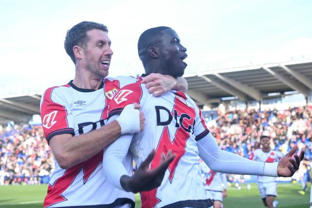 (260216) -- MADRID, Feb. 16, 2026 (Xinhua) -- Nobel Mendy (R) of Vallecano celebrates a goal with teammate Florian Lejeune during the La Liga football match between Rayo Vallecano and Atletico de Madrid in Madrid, Spain, Feb. 15, 2026. (Photo by Gustavo Valiente/Xinhua)