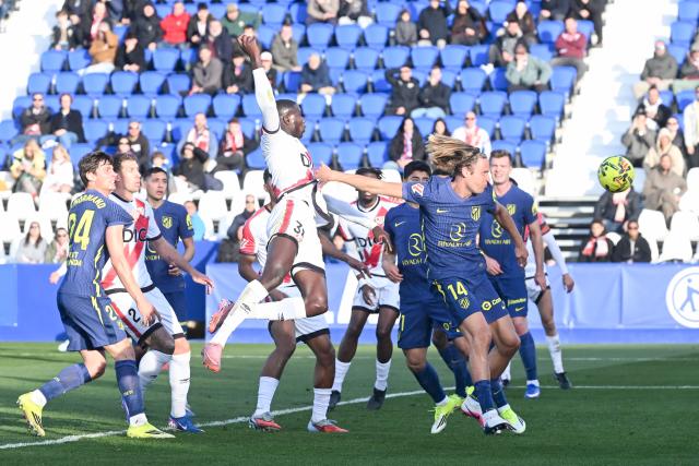 (260216) -- MADRID, Feb. 16, 2026 (Xinhua) -- Nobel Mendy (top) of Vallecano scores during the La Liga football match between Rayo Vallecano and Atletico de Madrid in Madrid, Spain, Feb. 15, 2026. (Photo by Gustavo Valiente/Xinhua)