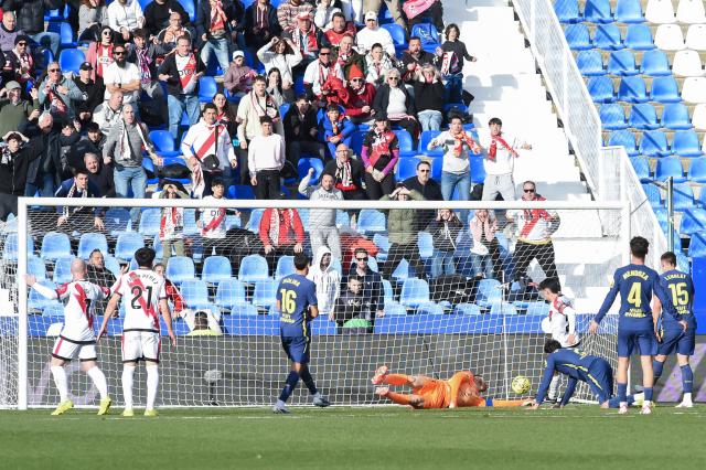 (260216) -- MADRID, Feb. 16, 2026 (Xinhua) -- Oscar Valentin (3rd R) of Vallecano scores a goal with teammate Florian Lejeune during the La Liga football match between Rayo Vallecano and Atletico de Madrid in Madrid, Spain, Feb. 15, 2026. (Photo by Gustavo Valiente/Xinhua)