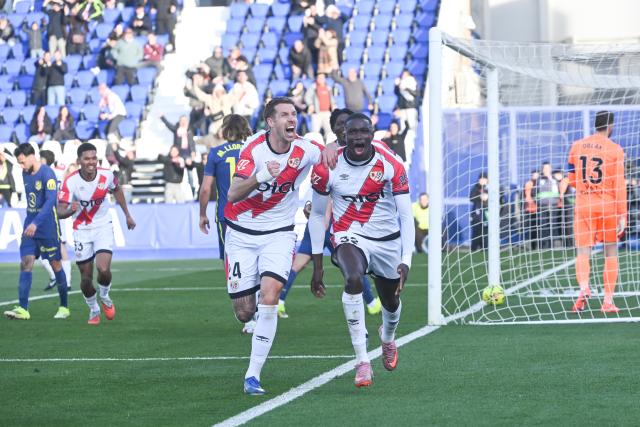 (260216) -- MADRID, Feb. 16, 2026 (Xinhua) -- Nobel Mendy (R) of Vallecano celebrates a goal with teammate Florian Lejeune during the La Liga football match between Rayo Vallecano and Atletico de Madrid in Madrid, Spain, Feb. 15, 2026. (Photo by Gustavo Valiente/Xinhua)