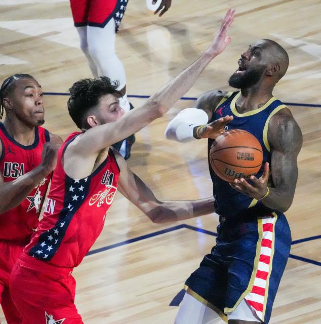 (260216) -- LOS ANGELES, Feb. 16, 2026 (Xinhua) -- USA Stripes' LeBron James (R) competes during the NBA All Star Game between Team USA Stripes and Team USA Stars in Los Angeles, the United States, Feb. 15, 2026. (Photo by Sun Yuxuan/Xinhua)