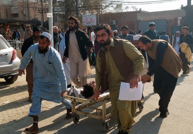(260216) -- BANNU, Feb. 16, 2026 (Xinhua) -- People transfer the injured to a hospital in Bannu district of Khyber Pakhtunkhwa province, Pakistan, Feb. 16, 2026.
  At least two people, including a child, were killed and several others injured in a blast in Pakistan's northwest Khyber Pakhtunkhwa province on Monday, police said. (Str/Xinhua)