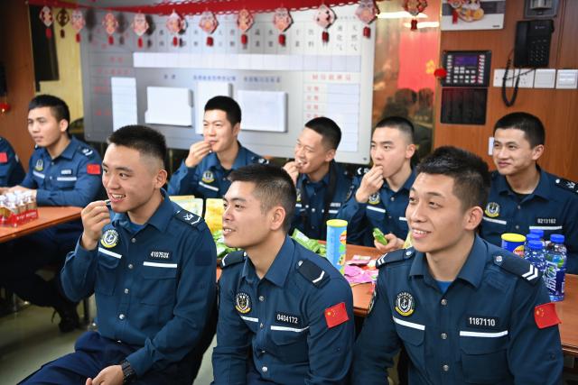 (260216) -- SOUTH CHINA SEA, Feb. 16, 2026 (Xinhua) -- Law enforcers attend a celebration gathering for the Spring Festival aboard the China Coast Guard (CCG) vessel Wanshan in the territorial waters of China's Huangyan Dao on Feb. 12, 2026.
  Law enforcers aboard the China Coast Guard (CCG) vessel Wanshan remain on duty during this year's Spring Festival, a most cherished moment for family reunions in China. (Photo by Zhai Yifan/Xinhua)
