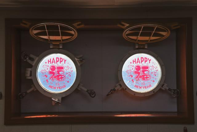 (260216) -- SOUTH CHINA SEA, Feb. 16, 2026 (Xinhua) -- Spring Festival decorations are seen on portholes aboard the China Coast Guard (CCG) vessel Wanshan in the territorial waters of China's Huangyan Dao on Feb. 11, 2026.
  Law enforcers aboard the China Coast Guard (CCG) vessel Wanshan remain on duty during this year's Spring Festival, a most cherished moment for family reunions in China. (Photo by Zhai Yifan/Xinhua)