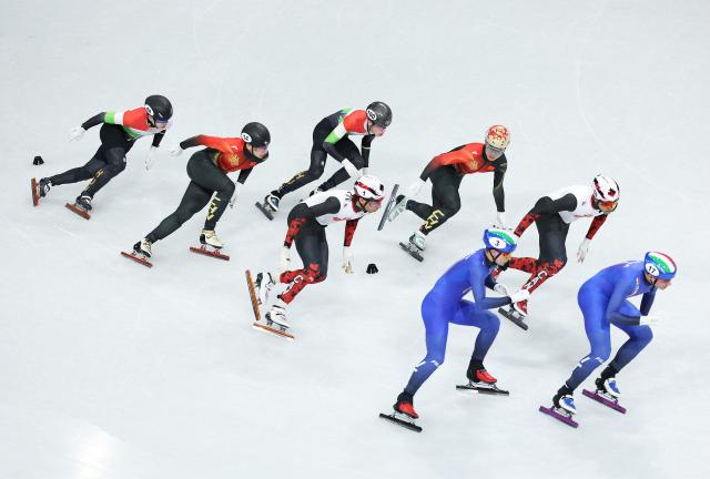 (260216) -- MILAN, Feb. 16, 2026 (Xinhua) -- Liu Shaoang (2nd L) and Li Wenlong (5th L) of China compete during the short track speed skating men's 5000m relay semifinal at the Milan-Cortina 2026 Olympic Winter Games in Milan, Italy, Feb. 16, 2026. (Xinhua/Li Ming)