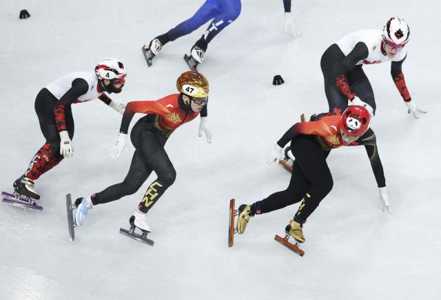 (260216) -- MILAN, Feb. 16, 2026 (Xinhua) -- Zhang Bohao (2nd L) and Lin Xiaojun (2nd R) of China compete during the short track speed skating men's 5000m relay semifinal at the Milan-Cortina 2026 Olympic Winter Games in Milan, Italy, Feb. 16, 2026. (Xinhua/Li Ming)