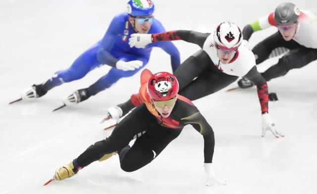(260216) -- MILAN, Feb. 16, 2026 (Xinhua) -- Lin Xiaojun (front) of China competes during the short track speed skating men's 5000m relay semifinal at the Milan-Cortina 2026 Olympic Winter Games in Milan, Italy, Feb. 16, 2026. (Xinhua/Xue Yuge)